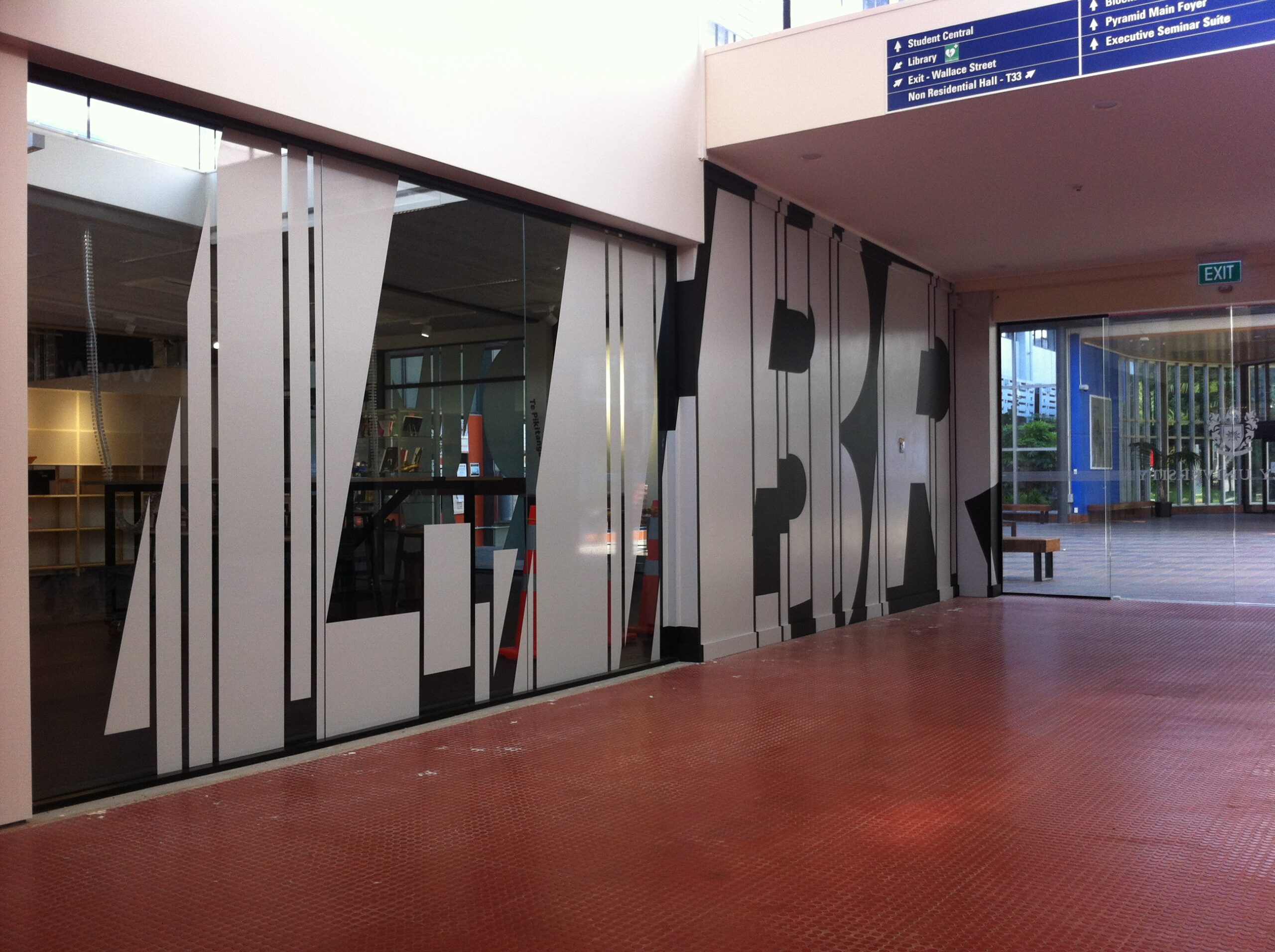 Massey Library. Hand cut vinyl graphic on glass.